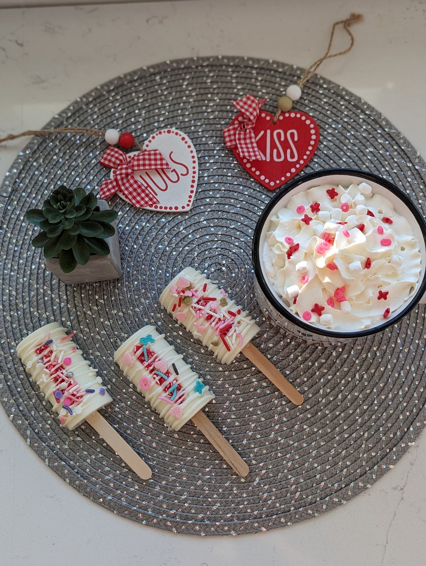 White Chocolate Peppermint Hot Cocoa Bombsicle on a stick